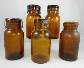 Appraisal: Lightning Fruit Jars Fruit Jars- 'Lightning' quarts amber base marked