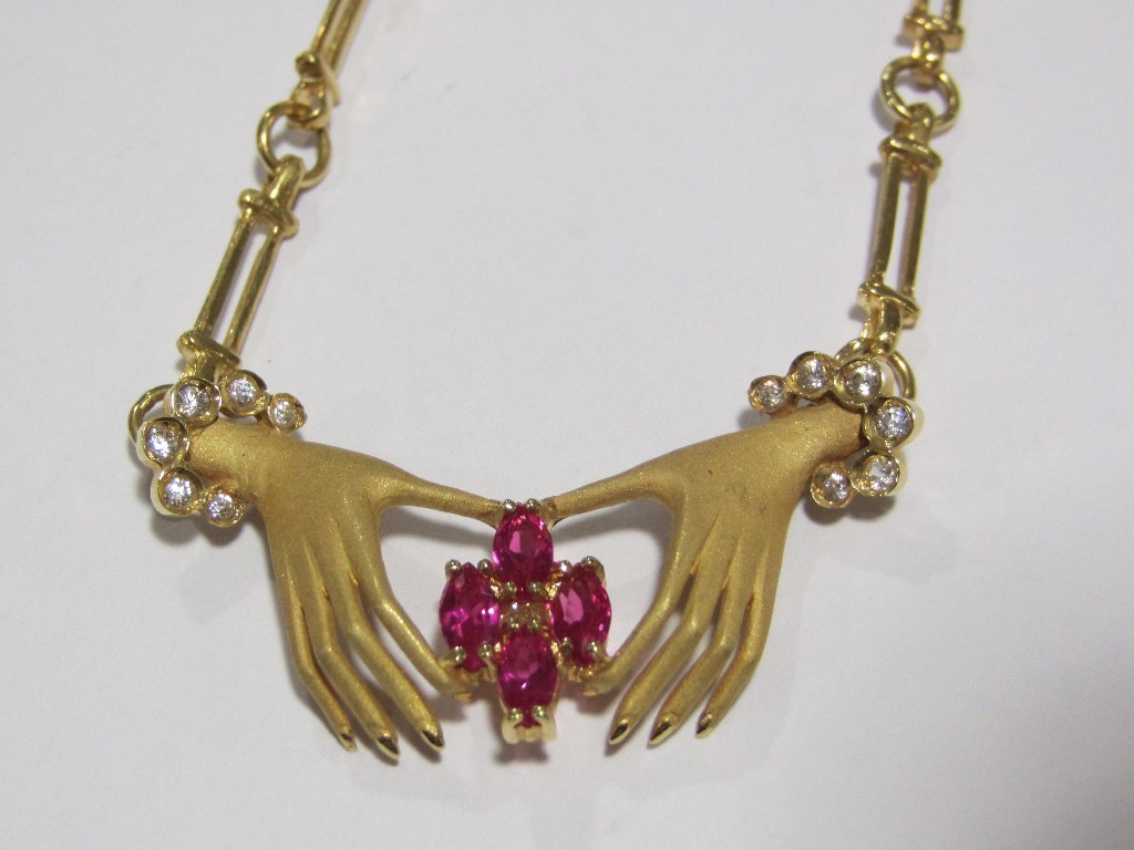 Appraisal: Eighteen carat gold ruby and diamond set necklace with hands