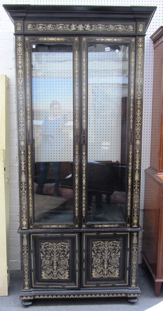 Appraisal: A th century Milanese bone inlaid ebonised two door display