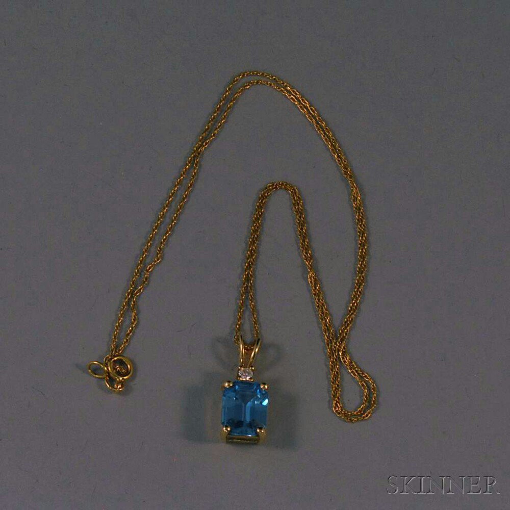 Appraisal: kt Gold Light Blue Gemstone and Diamond Pendant on Chain