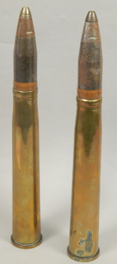 Appraisal: A pair of WWII brass artillery shells with bullets cm