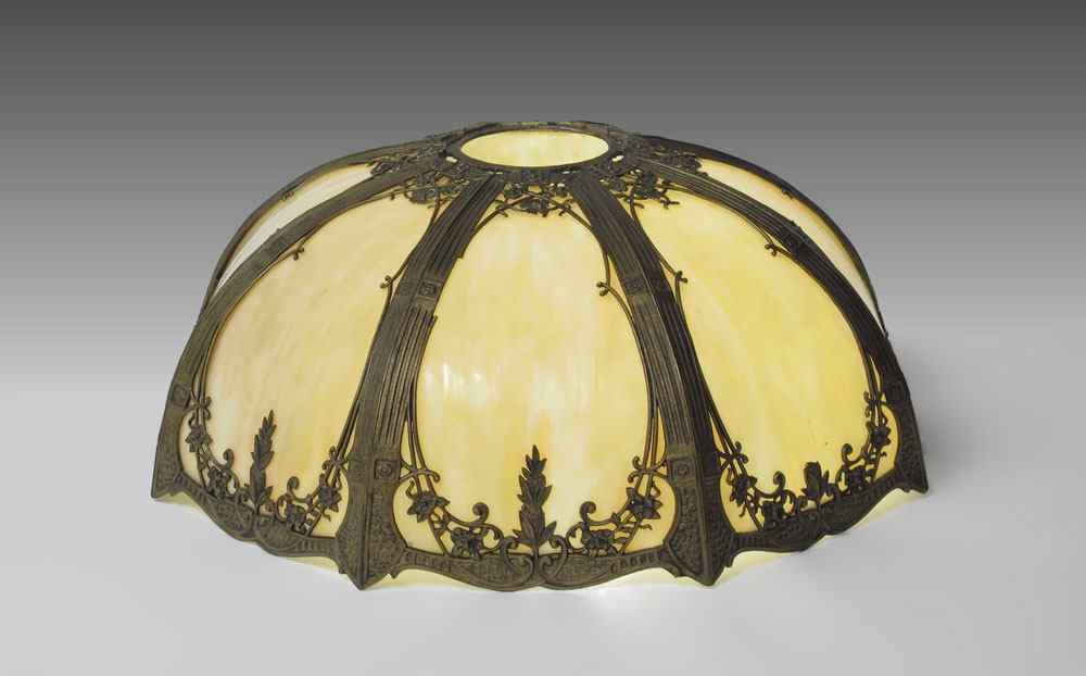 Appraisal: PANEL SLAG GLASS LAMP SHADE Filigree frame panel caramel slag