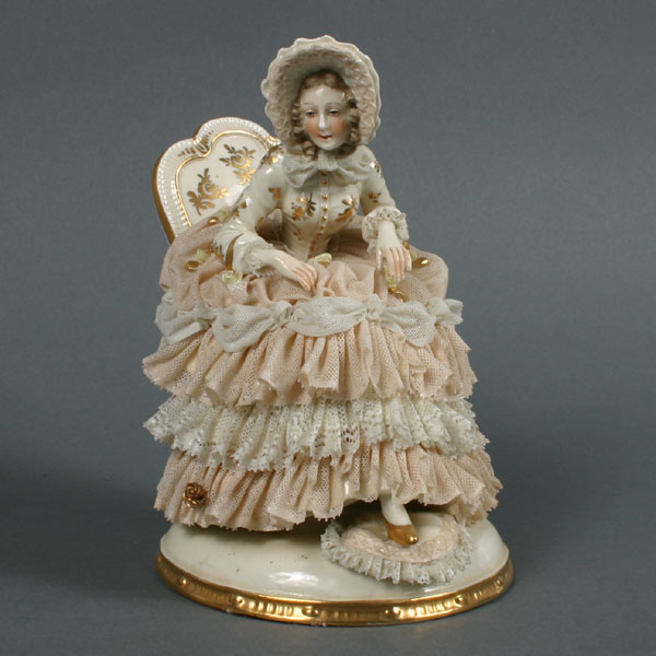 Appraisal: Dresden lace hand painted porcelain figure seated woman with gilt