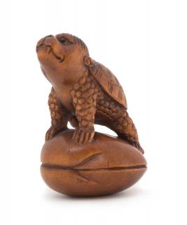 Appraisal: A Carved Wood Netsuke of a Kappa A Carved Wood