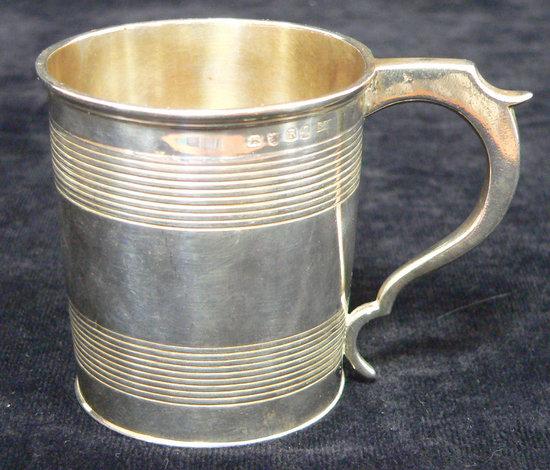 Appraisal: A George III mug with thread decoration and C scroll