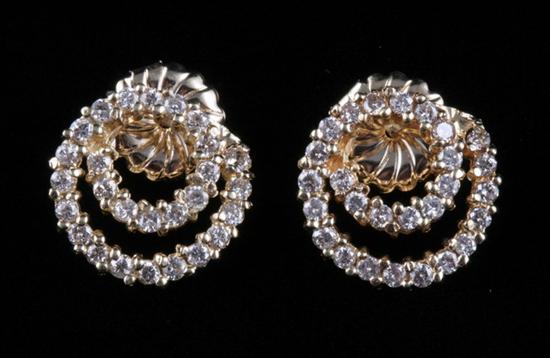 Appraisal: PAIR K YELLOW GOLD AND DIAMOND SWIRL DESIGN EARRINGS Each