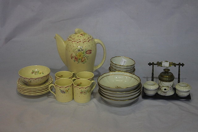 Appraisal: A SUSIE COOPER IVORY GROUND PART COFFEE SET four English