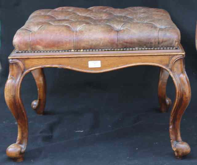 Appraisal: A VICTORIAN STYLE STOOL of square cut form with leather