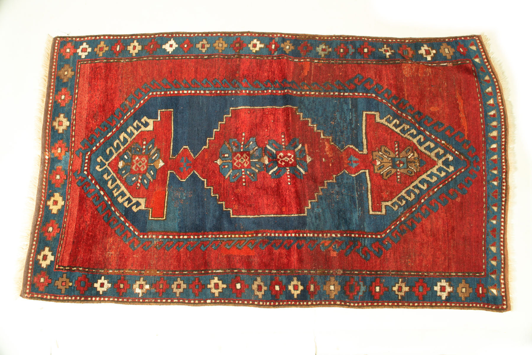 Appraisal: ORIENTAL RUG First quarter th century Kazak in blue and