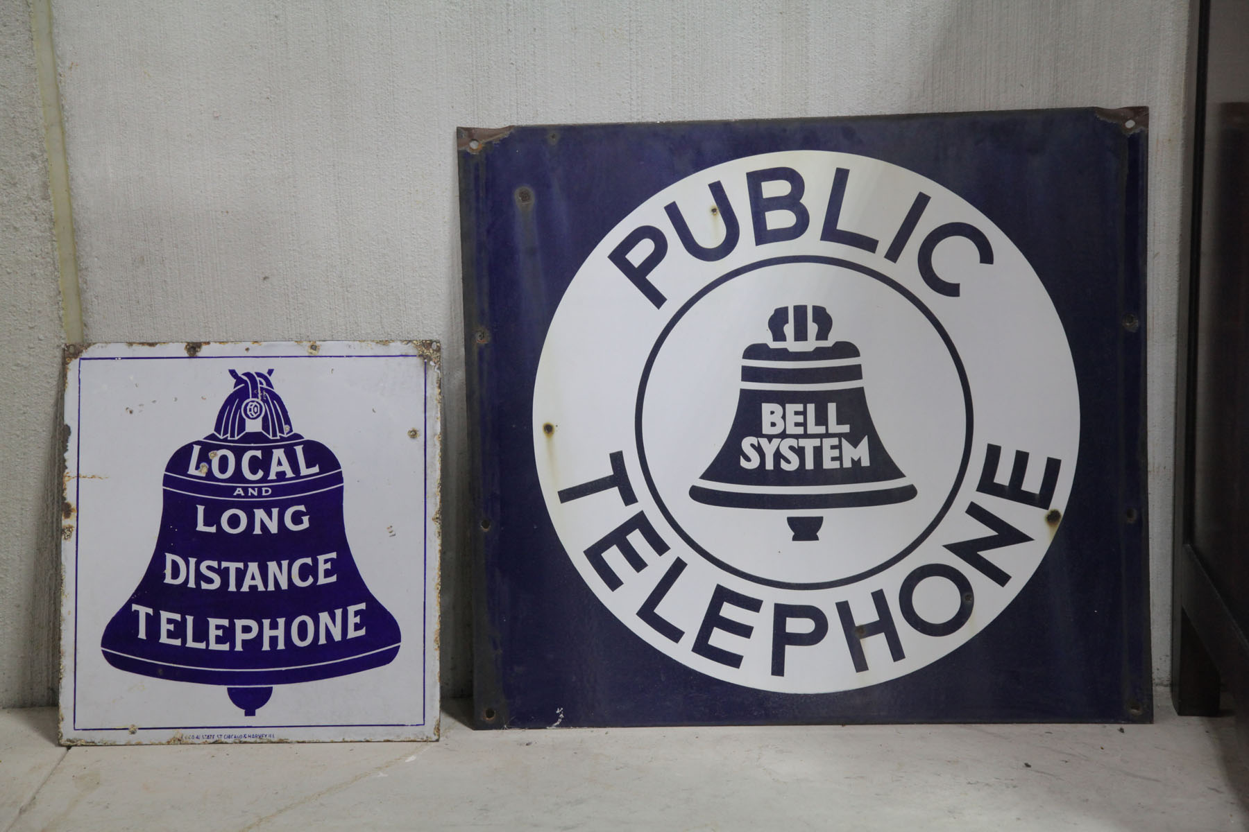 Appraisal: TWO TELEPHONE SIGNS American mid th century Blue and white