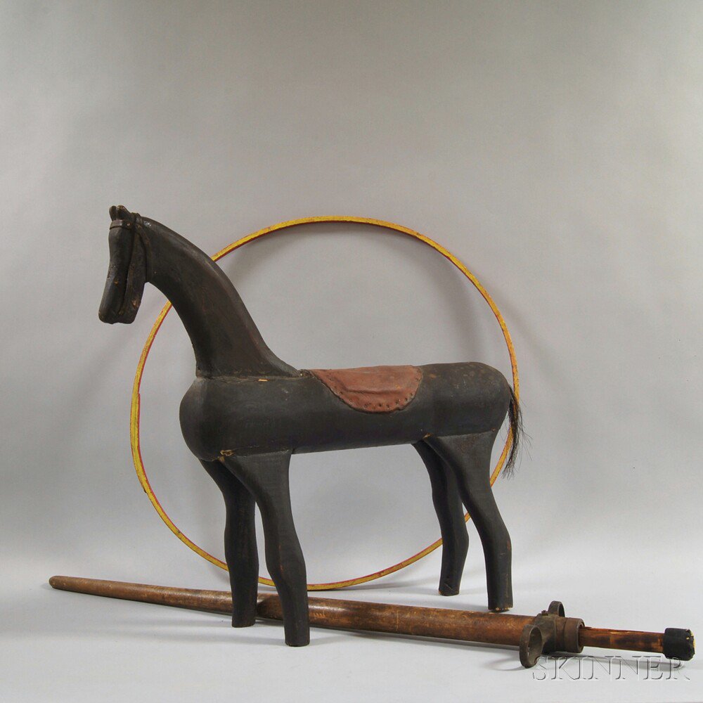 Appraisal: Three Wooden Toys a carved and black-painted wooden hobby horse