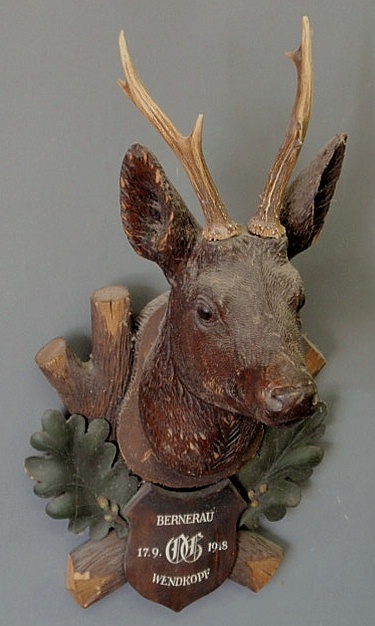 Appraisal: Black Forest carved stag head plaque with deer antlers and