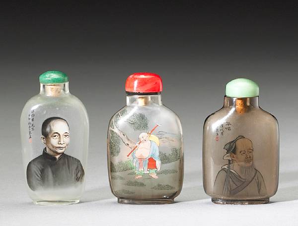 Appraisal: Three inside-painted snuff bottles The first a glass bottle signed