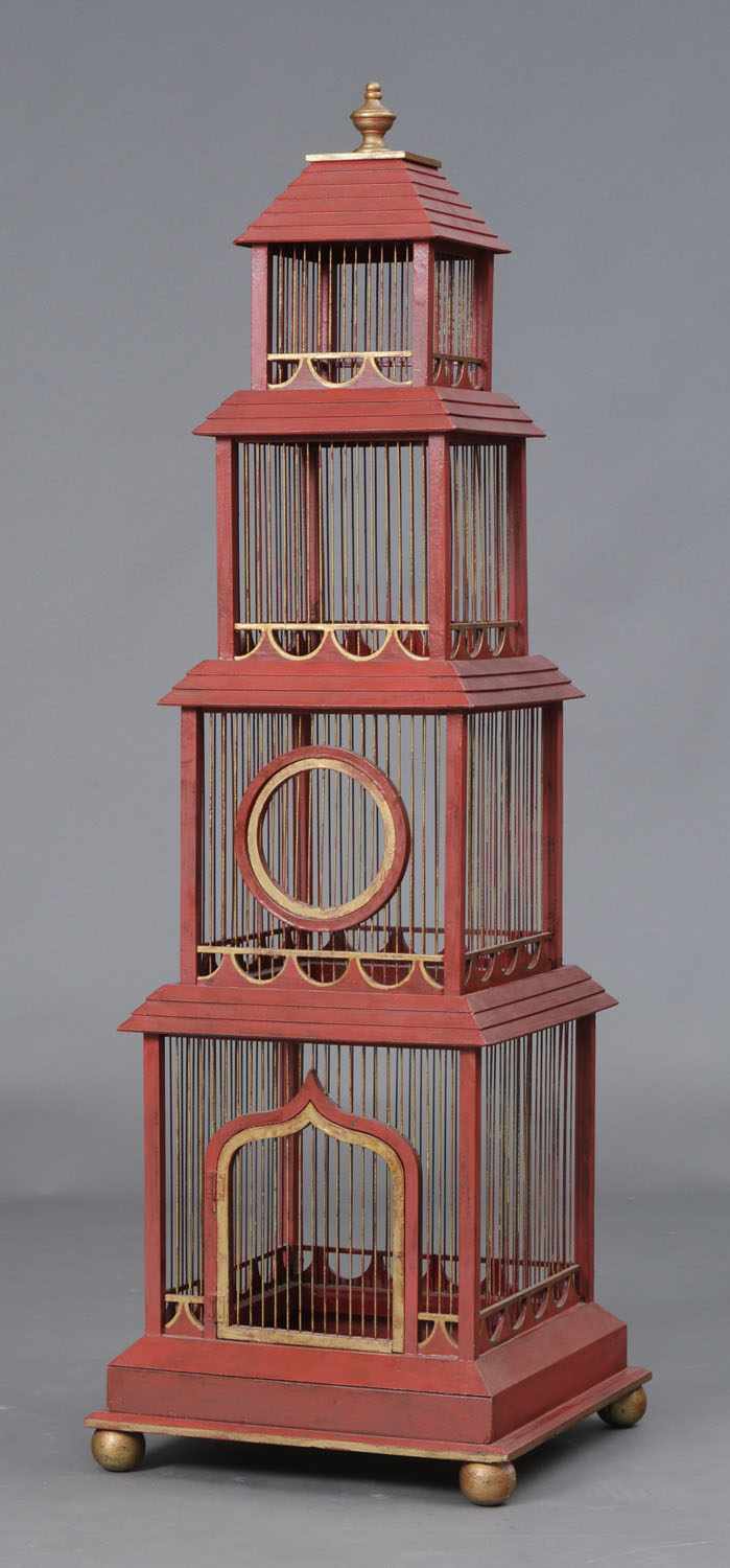 Appraisal: CINNABAR RED PAINTED AND PARCEL-GILT BIRDCAGE Incorporating graduated tiers with