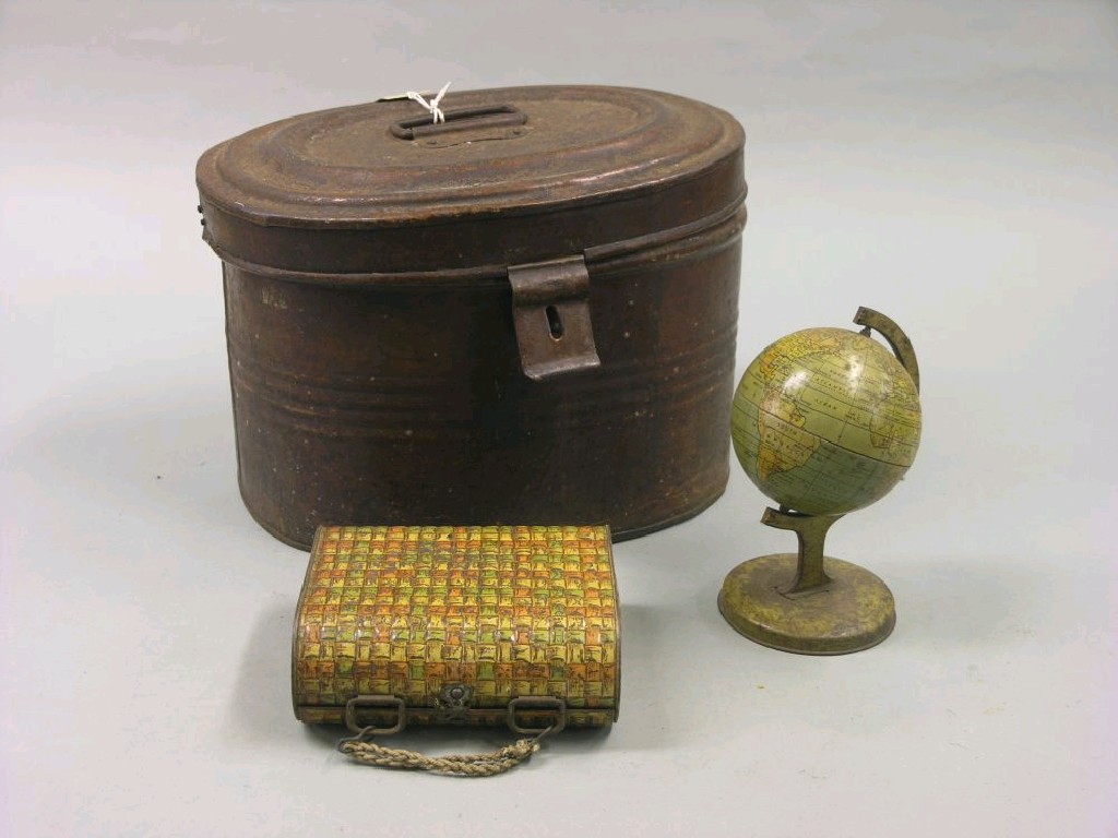 Appraisal: A lithograph tin-plate globe in three other tin-plate boxes and