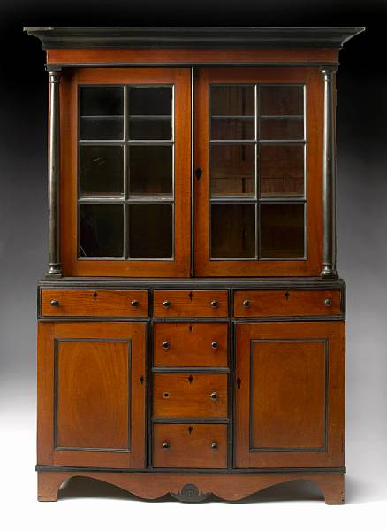 Appraisal: A Dutch Colonial ebony and mahogany cabinet first half th