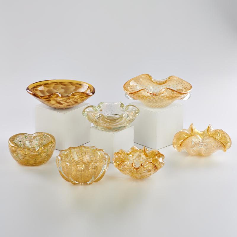 Appraisal: MURANO Seven hand blown glass bowls with encased gold-foil decoration