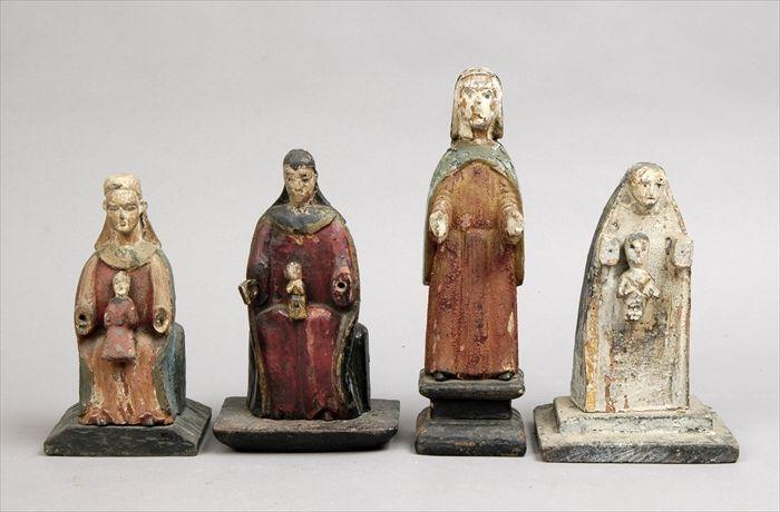 Appraisal: Four Polychrome Carved Wood Santos Figures to in Provenance The