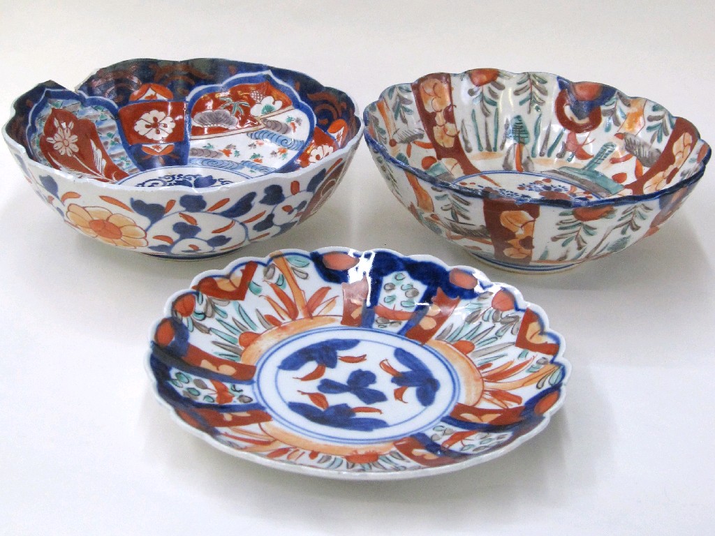 Appraisal: Two Imari bowls and an Imari plate