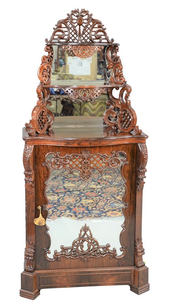 Appraisal: Rosewood Victorian Etagere having pierce carved top with two mirror