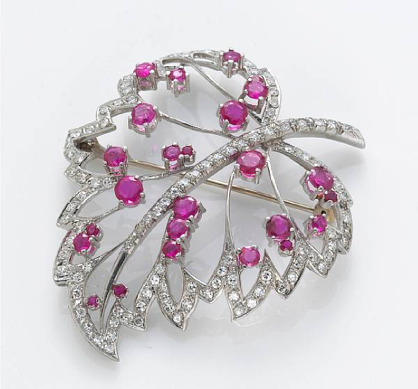 Appraisal: A ruby diamond and k white gold leaf brooch estimated