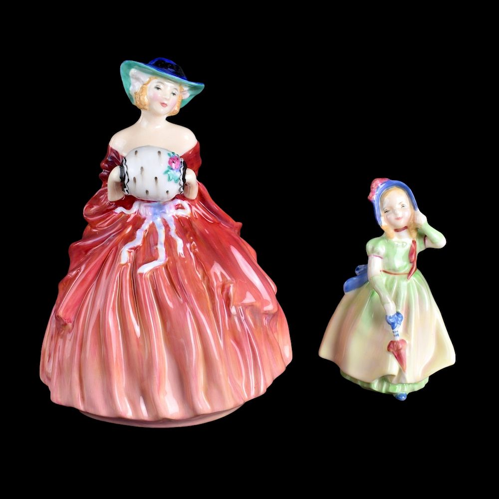 Appraisal: Two Royal Doulton Figurines Two Royal Doulton Porcelain Figurines Genevieve