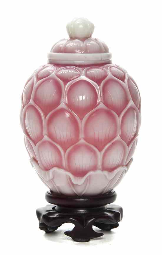 Appraisal: A Chinese Peking Glass Lidded Vase of lotus form with