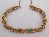 Appraisal: A yellow metal tests carat gold turquoise necklace approx grams