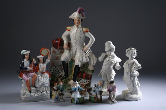 Appraisal: EIGHT PORCELAIN AND CERAMIC FIGURES Staffordshire Napoleon and a young