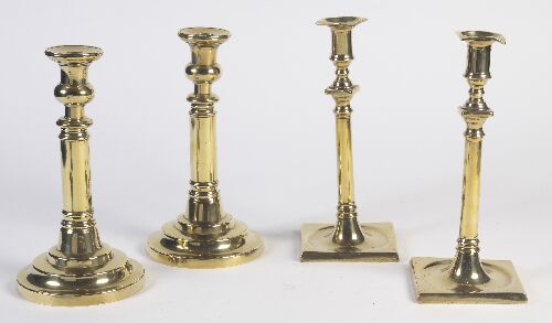 Appraisal: A pair of early th century brass candlesticks with square