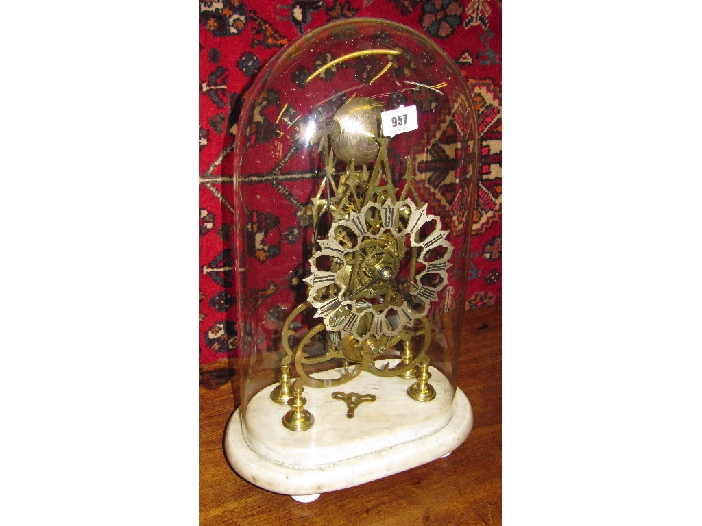 Appraisal: Brass skeleton clock on marble base with glass cover