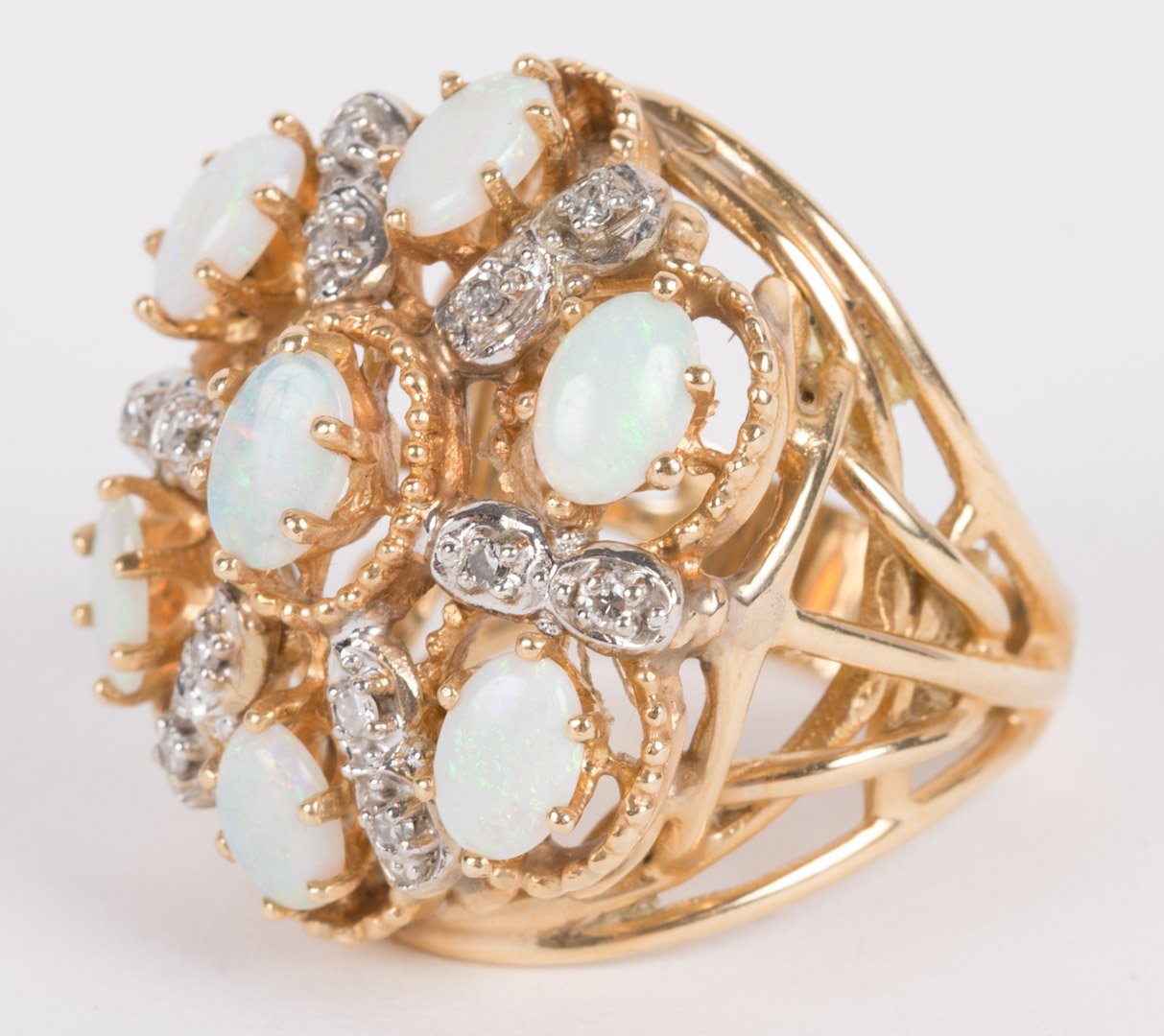 Appraisal: An Opal Diamond Cluster Ring k yellow gold size