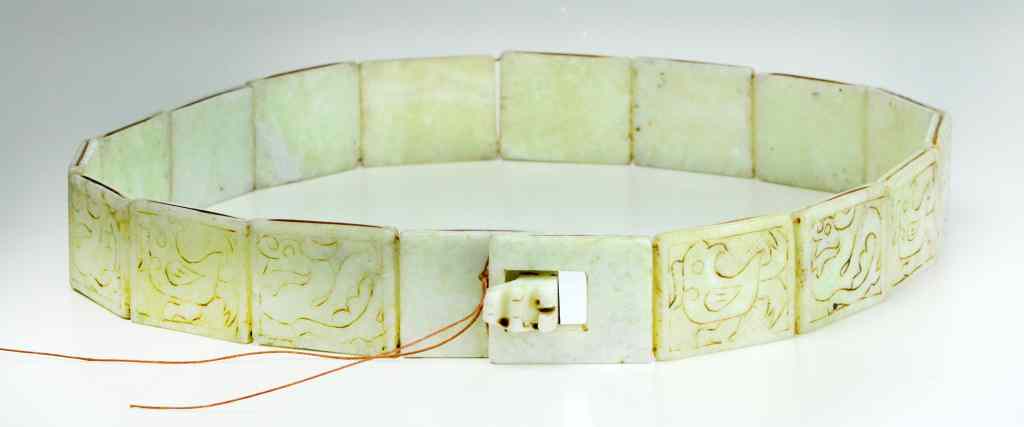 Appraisal: Chinese White Hardstone BeltThe plaques finely carved to depict alternating