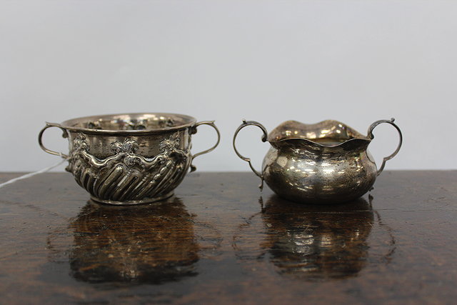 Appraisal: A VICTORIAN EMBOSSED SILVER PORRINGER marks for London makers mark