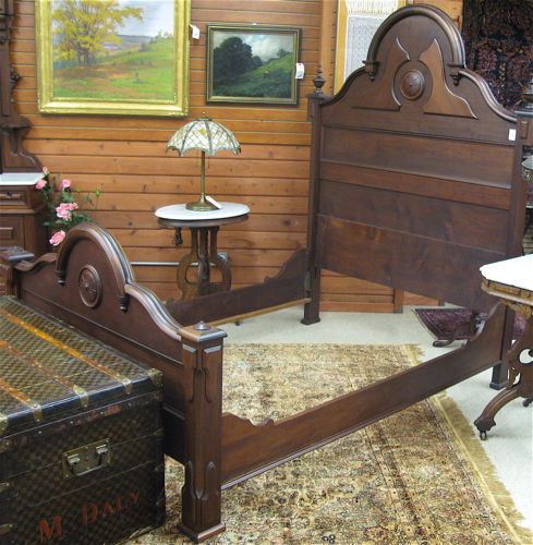 Appraisal: VICTORIAN WALNUT BED AND DRESSER SET American c - The