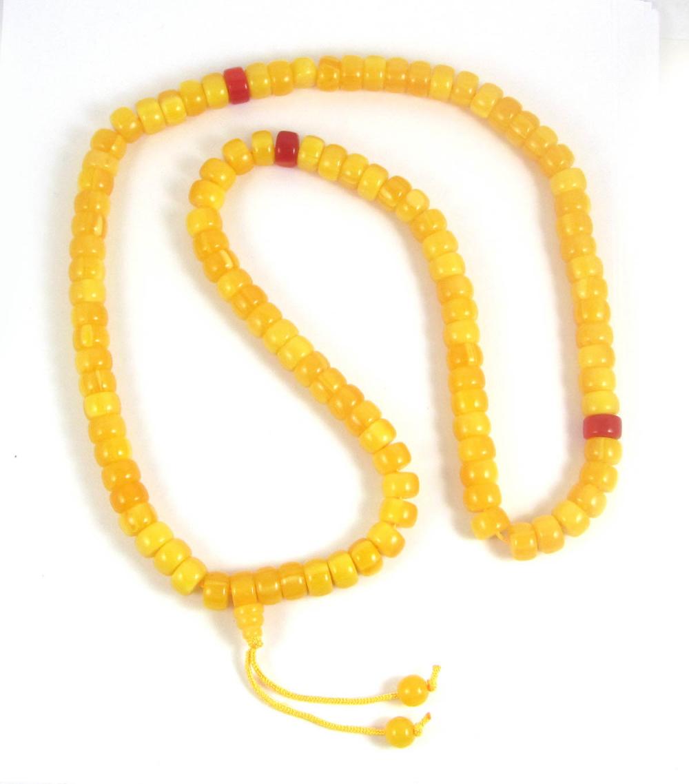 Appraisal: PRESSED BALTIC AMBER PRAYER BEADS measuring - in length strung