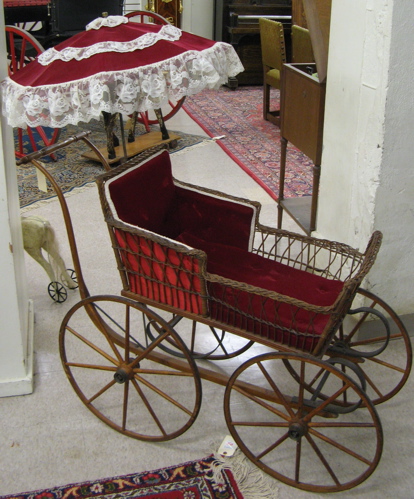 Appraisal: VICTORIAN WICKER AND OAK BABY CARRIAGE American late th century