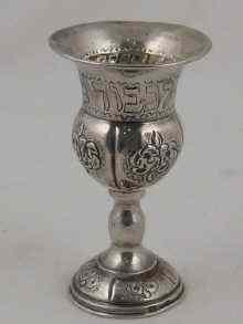 Appraisal: A white metal tests silver kiddush cup marked ht cm