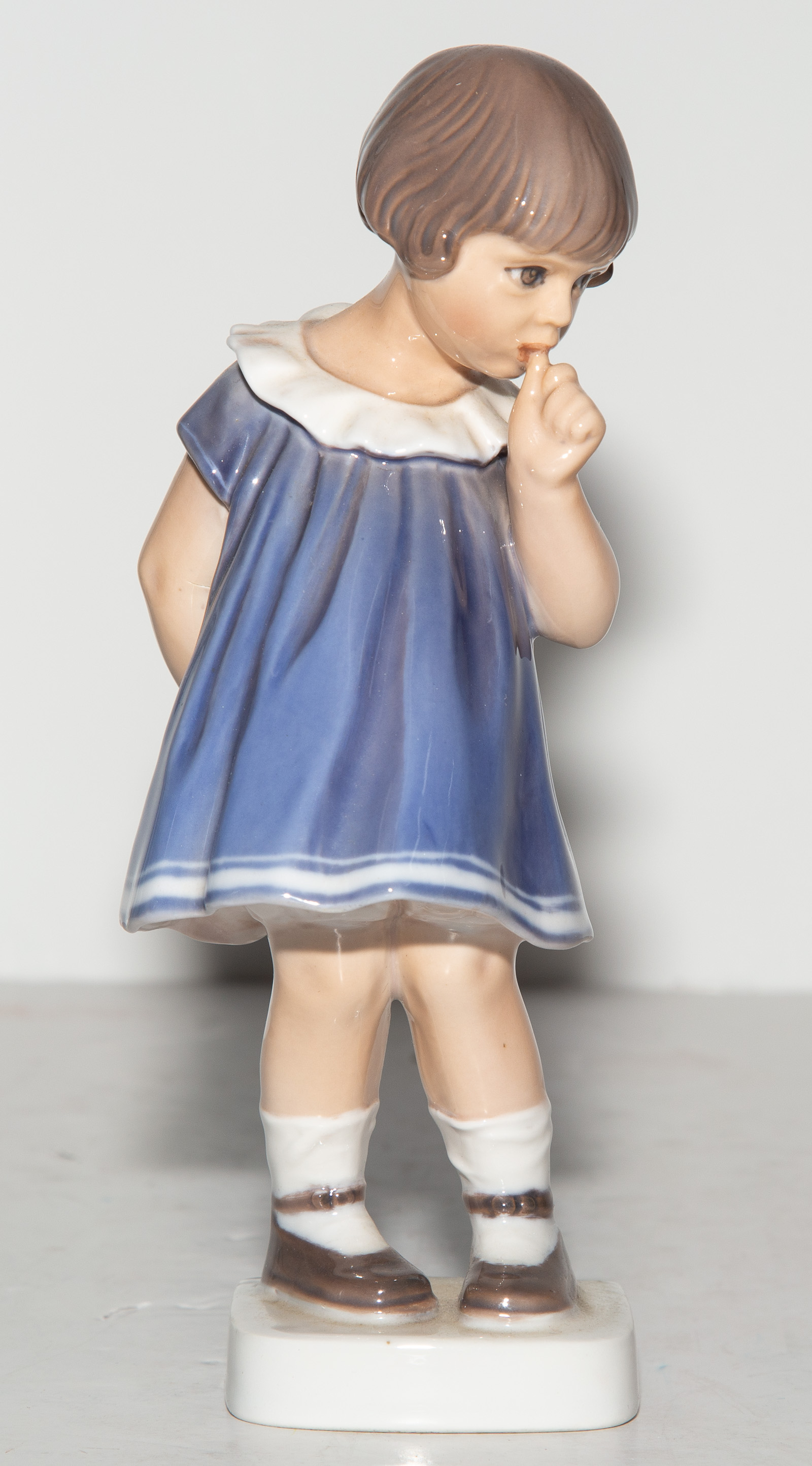 Appraisal: DAHL JENSEN COPENHAGEN PORCELAIN FIGURE Toddler Girl Sucking Thumb