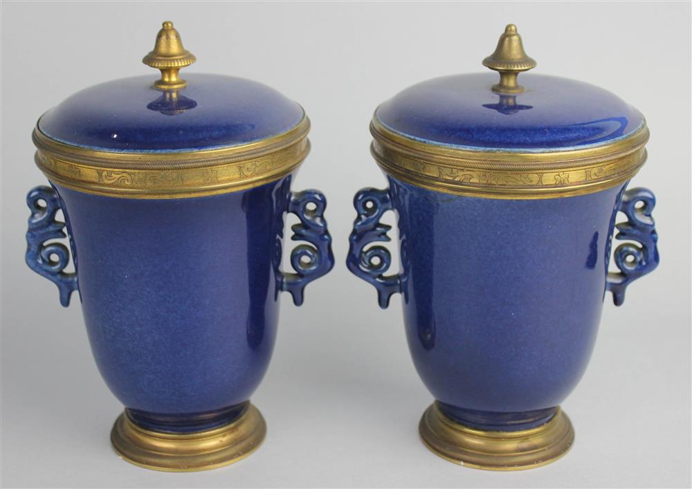 Appraisal: PAIR OF CHINESE POWDER BLUE-GLAZED GILT-BRONZE MOUNTED COVERED CUPS QING