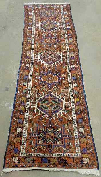 Appraisal: Heriz oriental hall runner with seven geometric medallions and a