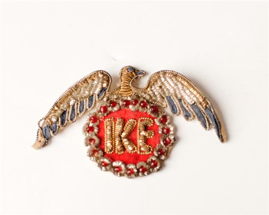 Appraisal: An Early IKE Embroidered Eagle Emblem in gilt and silver