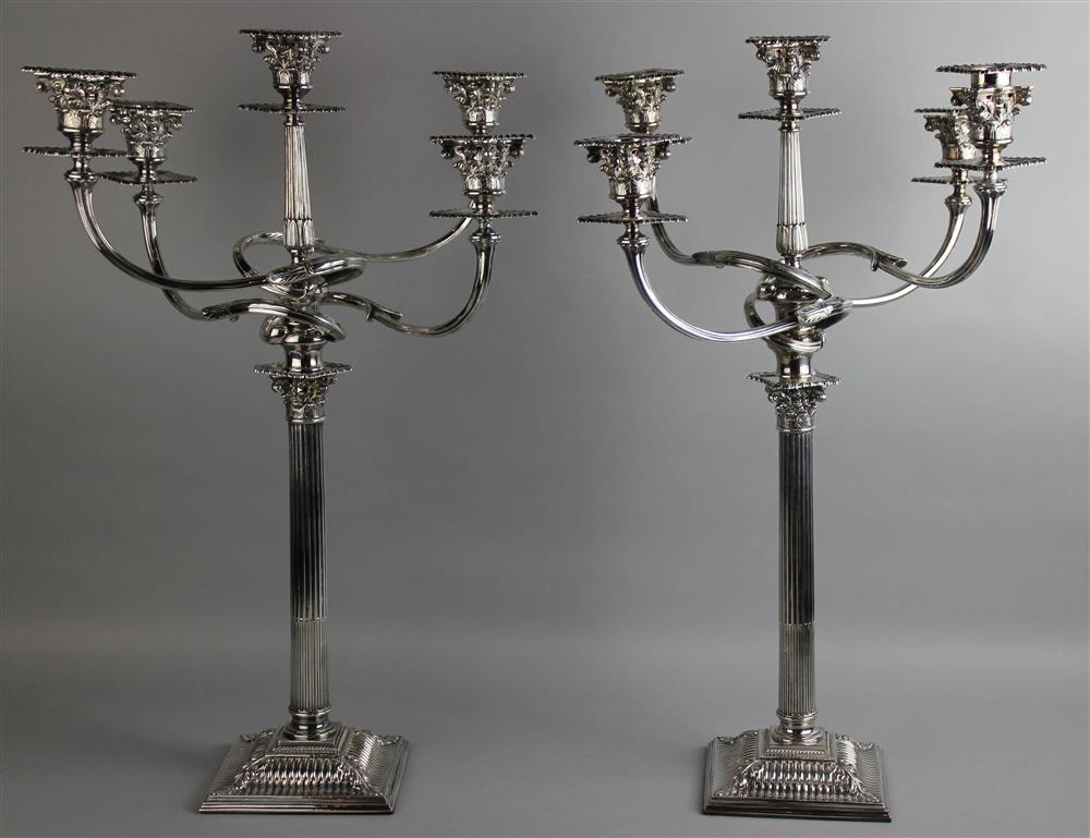 Appraisal: PAIR OF GEORGE III STYLE SILVERPLATED FIVE LIGHT CANDELABRA with