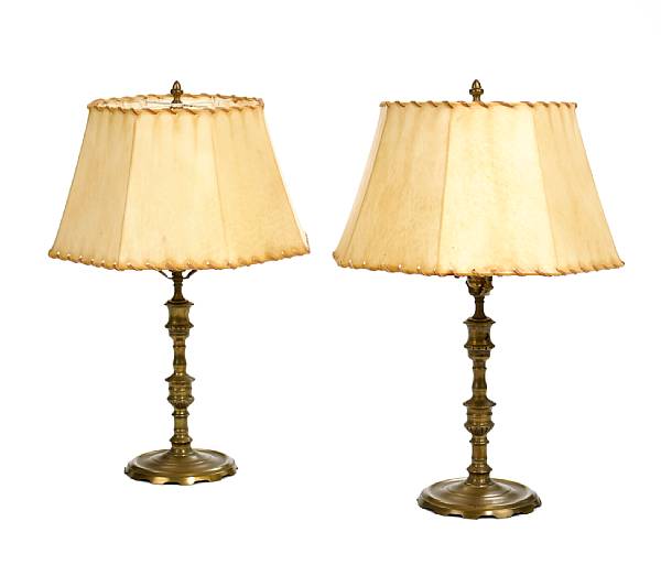 Appraisal: A pair of Baroque brass candlesticks now as table lamps