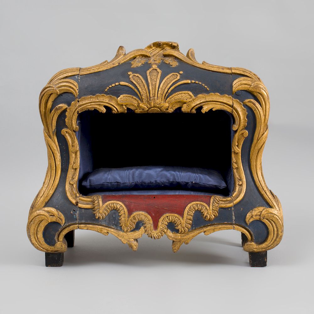 Appraisal: Italian Rococo Carved Painted and Parcel-Gilt Oak Dog Bed With