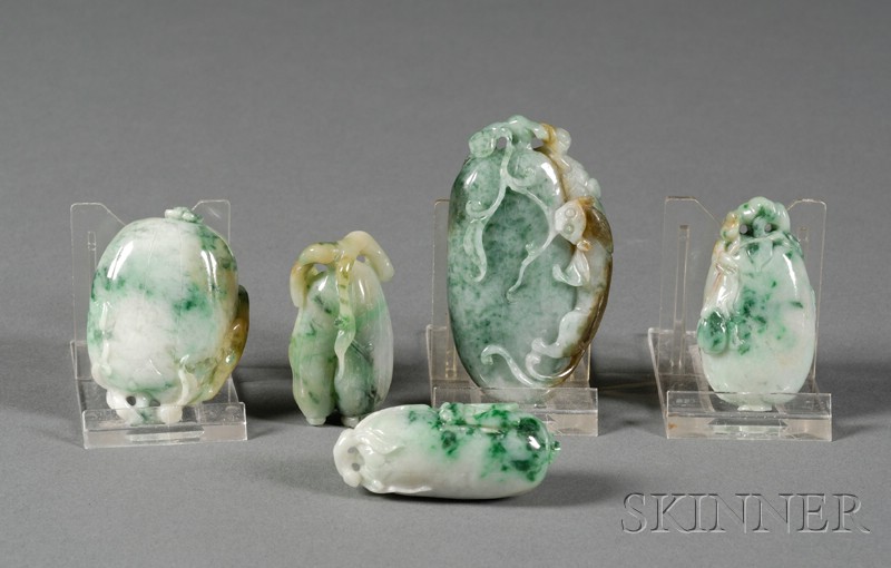 Appraisal: Five Jade Pendants green with bright green markings carving of