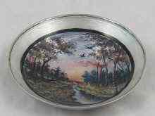 Appraisal: A white metal tests silver bowl with enamelled forest scene