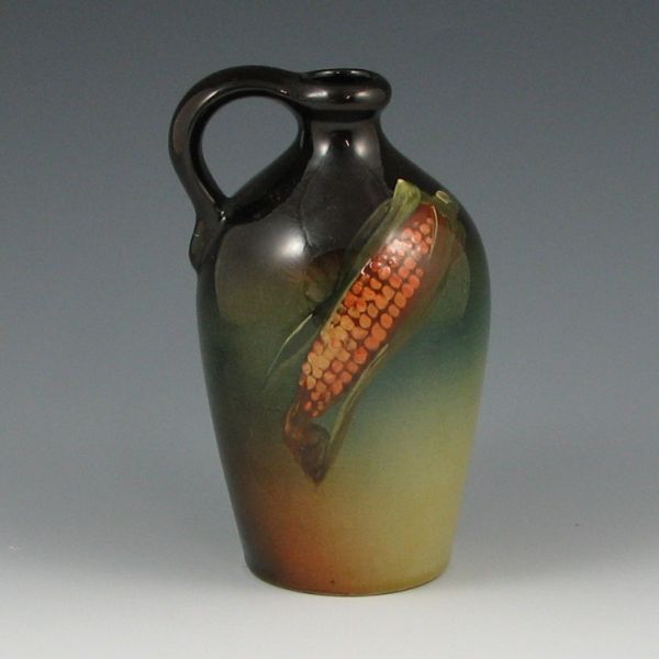 Appraisal: Lonhuda jug with corn decoration on a green tinted background