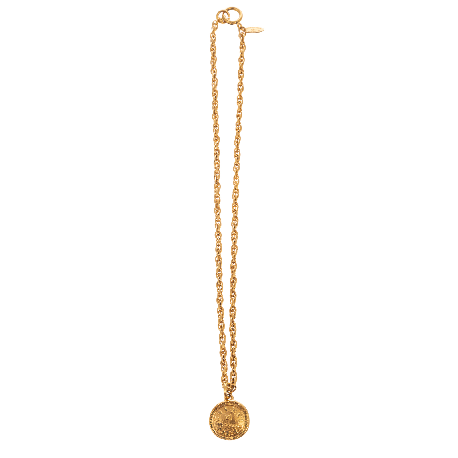 Appraisal: A CHANEL RUE CAMBON COIN PENDANT NECKLACE A gold plated