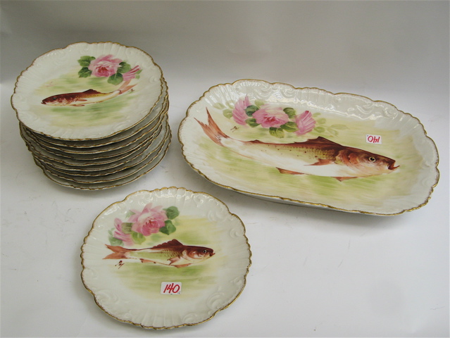 Appraisal: LDBC FLAMBEAU LIMOGES PORCELAIN FISH SET pieces hand painted with